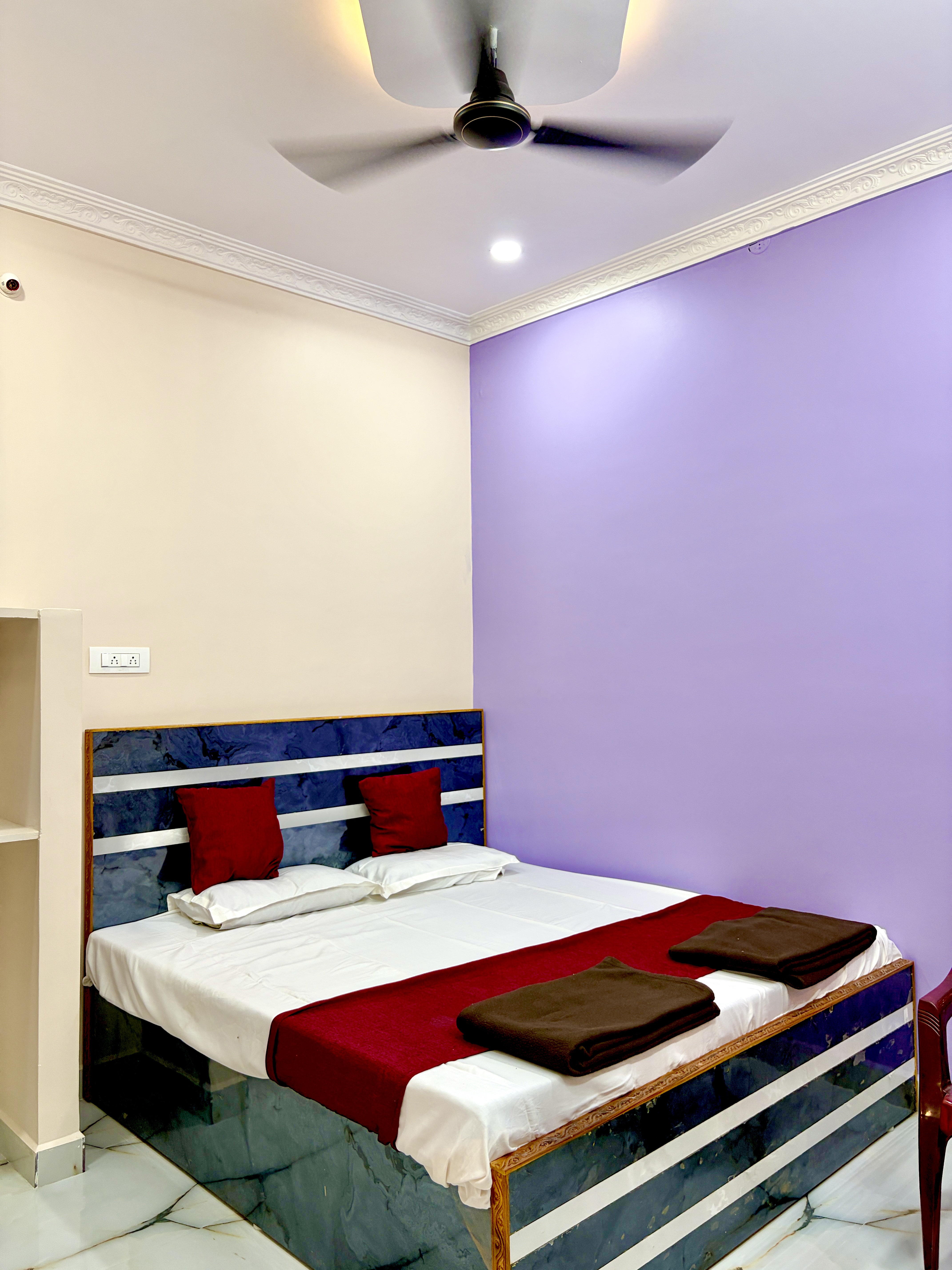 New purple Non AC room at SPSS Residency